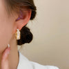 Lymphatic activity hoop earrings